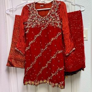 3 piece burnt orange suit with Palazzo pants.